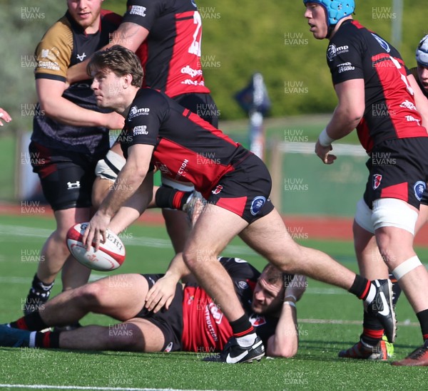 210326 - RGC v Aberavon - Super Rygbi Cymru (SRC) - Elis Horgan of Aberavon passes the ball from the ruck