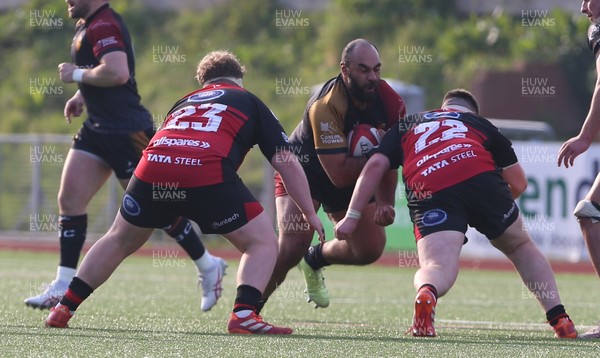 210326 - RGC v Aberavon - Super Rygbi Cymru (SRC) - Jesse Williams of RGC is tackled by Evren Ozbilen and James Clegg of Aberavon