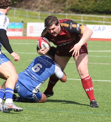 110426 - RGC v Bridgend - Super Rygbi Cymru (SRC) - Patrick Nelson  of RGC is tackled by Morgan Boobyer of Bridgend