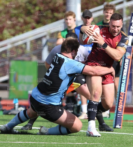 130925 - RGC v  Cardiff - Super Rygbi Cymru (SRC) -  Billy McBryde of RGC is tackled by Will Davies-King of Cardiff