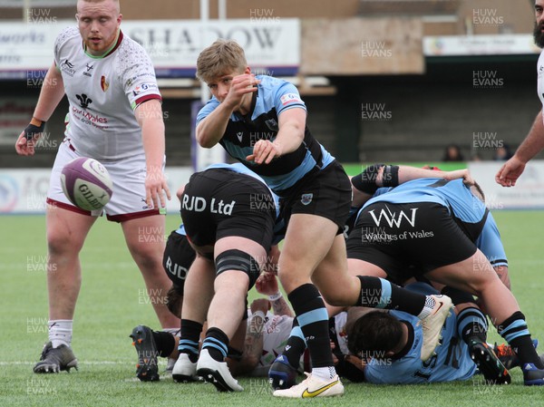 250323 - RGC v Cardiff - WRU Premiership Cup - Ethan Lloyd of Cardiff RFC passes the ball from the ruck
