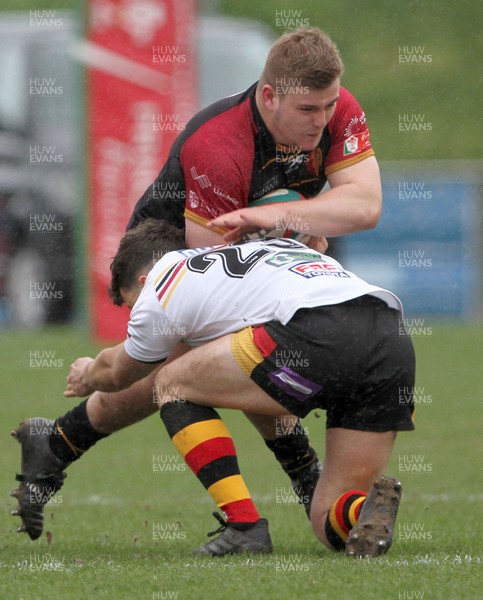 020319 - RGC v Carmarthen Quins - Principality Premiership -  Evan Yardley of RGC is tackled by Ifan Thomas of Carmarthen Quins