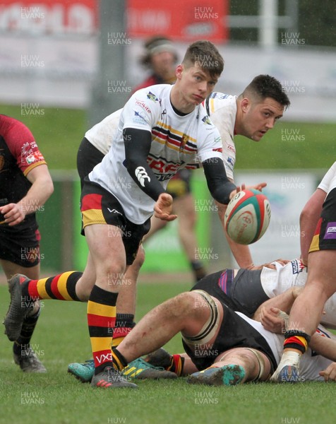 020319 - RGC v Carmarthen Quins - Principality Premiership -  Aron Williams of Carmarthen Quins passes the ball from the ruck
