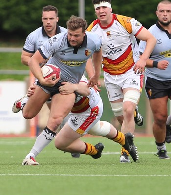 190926 - RGC v Carmarthen Quins - Super Rygbi Cymru (SRC) - Dion Jones of RGC is tackled by Lewis Morgan of Carmarthen Quins