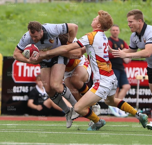 190926 - RGC v Carmarthen Quins - Super Rygbi Cymru (SRC) - Sam Jones of RGC is tackled by Aron Hemmings of Carmarthen Quins