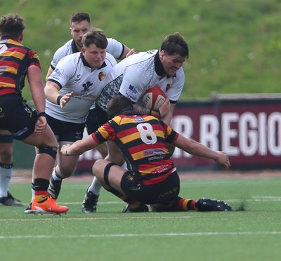 260425 - RGC v Carmarthen Quins - Super Rygbi Cymru (SRC) Playoffs - Patrick Nelson of RGC is tackled by Lewis Milni of Carmarthen Quins
