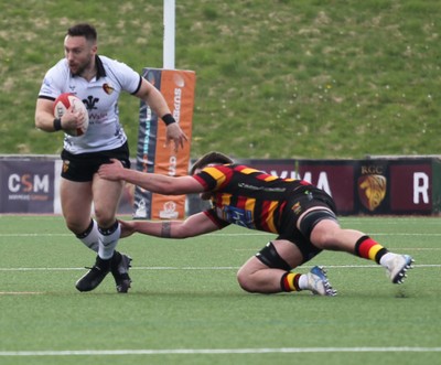 260425 - RGC v Carmarthen Quins - Super Rygbi Cymru (SRC) Playoffs - Billy McBryde of RGC breaks the tackle