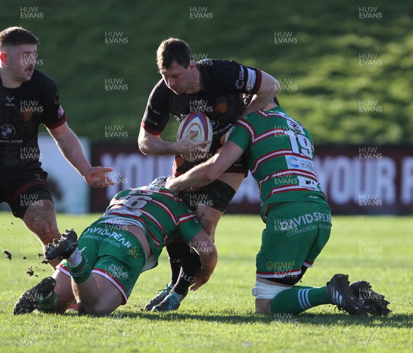 050322 - RGC v Ebbw Vale - Indigo Group Premiership - Andy Williams of RGC is tackled by Corey Talbot and Liam Lewis of Ebbw Vale RFC
