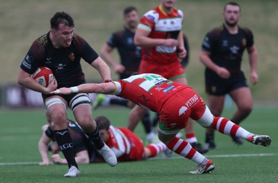 150225 - RGC v  Llandovery - Super Rygbi Cymru (SRC) - Cup Competition - Sam Williams of RGC is tackled by Kian Abraham of Llandovery