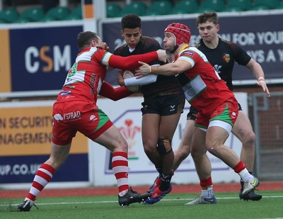 150225 - RGC v  Llandovery - Super Rygbi Cymru (SRC) - Cup Competition - Caio Parry is tackled by Adam Warren and Harri Doel of Llandovery