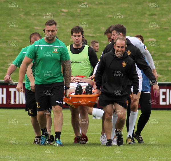 080919 - RGC V Merthyr - Indigo Group Premiership -  Craig Locke of Merthyr is stretchered off the field injured