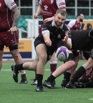 020324 - RGC v Neath - Indigo Group Premiership - Gruff Williams  of Neath RFC passes the ball from the ruck