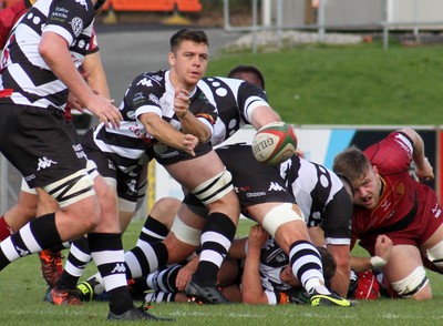 121019 - RGC v Pontypridd - Indigo Group Premiership -   Joel Raikes of Pontypridd passes the ball