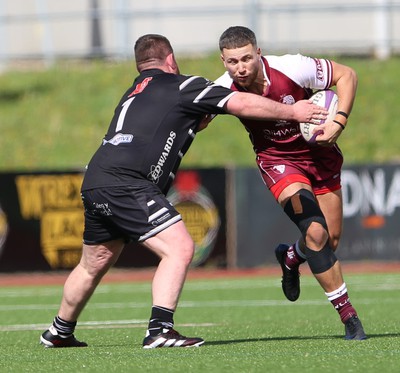 130424 - RGC v Pontypridd - Indigo Group Premiership - Rhys Tudor of RGC is tackled by Ben Stevens of Pontypridd RFC