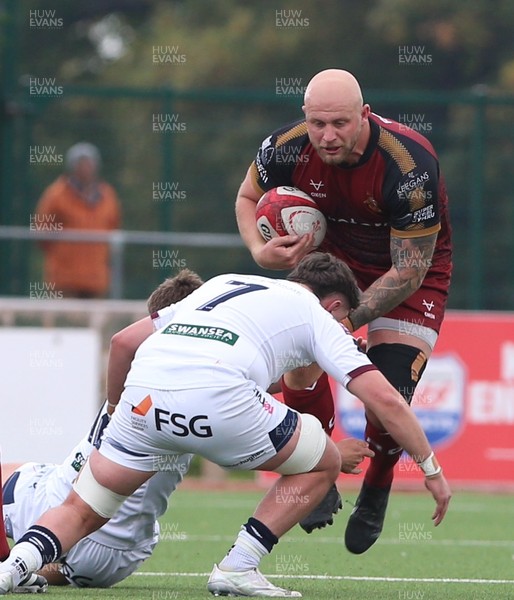 181025 - RGC v Swansea - Super Rygbi Cymru (SRC) - Welwyn Jones of RGC is tackled by Ethan Fackrell of Swansea