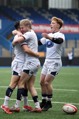 070326 - RGC v Swansea RFC - SRC plate Final -Mat Protheroe of Swansea celebrates scoring a try with team mates