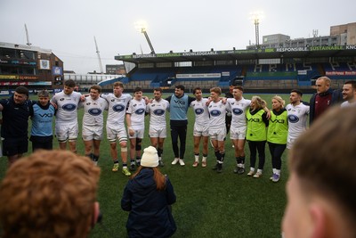 070326 - RGC v Swansea RFC - SRC plate Final - Joe Thomas of Swansea leads his sides huddle at full time
