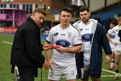 070326 - RGC v Swansea RFC - SRC plate Final - Leigh Halfpenny presents the winners medals