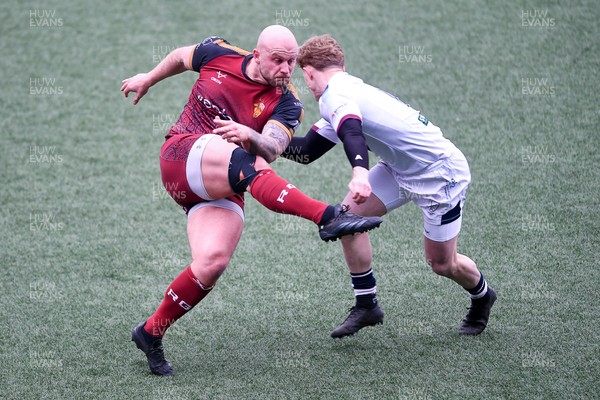 070326 - RGC v Swansea RFC - SRC plate Final - Danny Cross of RGC attempts to kick the ball away but follows through with a tackle from Harri Houston of Swansea