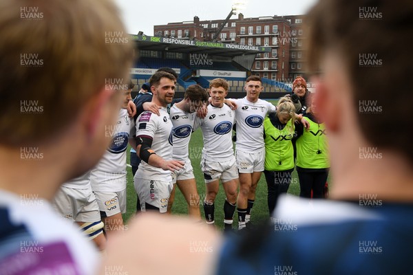 070326 - RGC v Swansea RFC - SRC plate Final - Joe Thomas of Swansea leads his sides huddle at full time