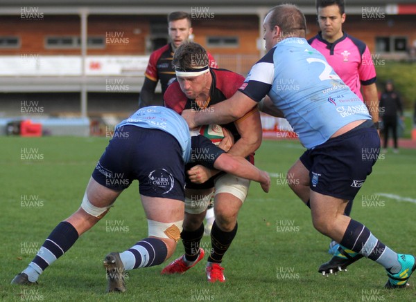 271018 - RGC1404 v Bargoed - Principality Premiership -  Andy Williams of RGC is tackled by Lewis Johnson and Lewys Lipiett of Bargoed