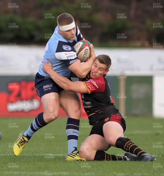 271018 - RGC1404 v Bargoed - Principality Premiership -  Lewis Johnson of Bargoed is tackled by Tom Hughes of RGC