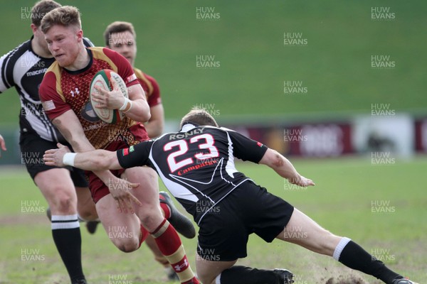 140418 - RGC1404 v Bedwas - Principality Premiership -   Danny Cross of RGC is tackled by Thomas Rowlands of Bedwas