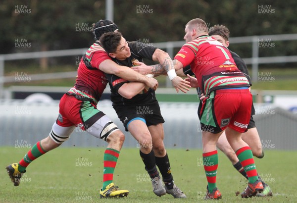 28  01 17 - RGC1404 v Dunvant RFC - National Cup - Jacob Botica of RGC is tackled by Adam Gregory and Robbie Morris of Dunvant RFC