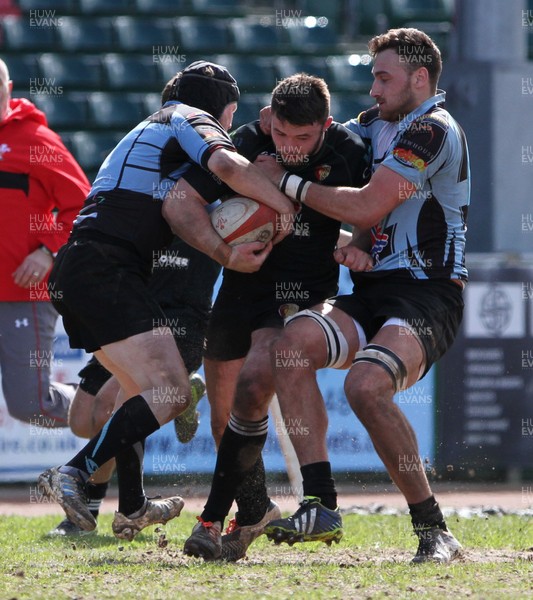 16 04 16 - RGC1404 v LLanharan RFC - SWALEC Championship - Huw Worthington of RGC is tackled by Tom Wilson and Paul Winter of Llanharan RFC