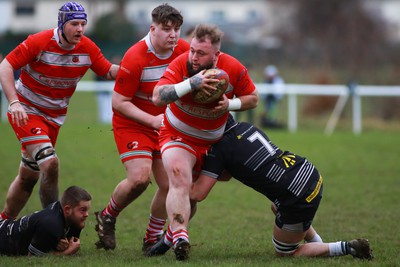 060124 - Rhiwbina v Ynysybwl - Admiral National League 1 East Central - Dewi Morris of Ynysybwl is tackled by Nathan Crothers of Rhiwbina