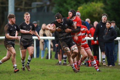 060124 - Rhiwbina v Ynysybwl - Admiral National League 1 East Central - George Southcombe of Rhiwbina is tackled by Joseph Williams of Ynysybwl