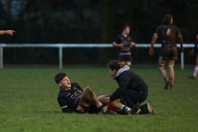 060124 - Rhiwbina v Ynysybwl - Admiral National League 1 East Central - Rhys Williams of Rhiwbina is injured late in the game 