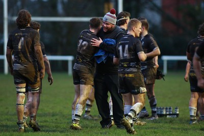 060124 - Rhiwbina v Ynysybwl - Admiral National League 1 East Central - Coaching staff and players of Rhiwbina celebrate at the end of the game