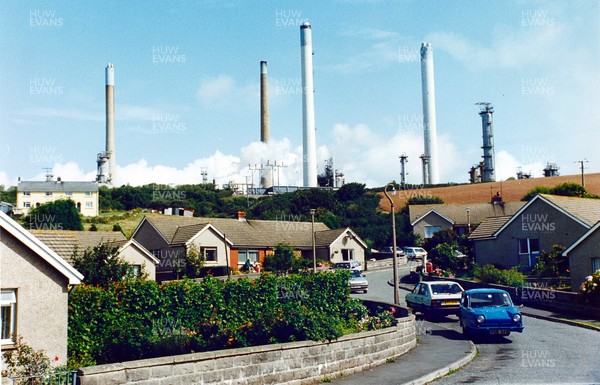 151093 - Picture shows the West Wales village of Rhoscrowther with the oil refinery in the background