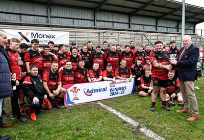 260425 - Rhymney RFC League Trophy Presentation - Admiral National League 3 East - Colin Wilks of the WRU presents the trophy to Club Captain Tyler Evans