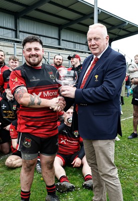 260425 - Rhymney RFC League Trophy Presentation - Admiral National League 3 East - Colin Wilks of the WRU presents the trophy to Club Captain Tyler Evans