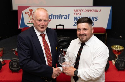 300526 - Rhymney RFC, Admiral National League 2 East Trophy Presentation - Colin Wilks, WRU National Council Member presents Rhymney RFC captain Tyler Evans with the league trophy after Rhymney win Admiral National League 2 East