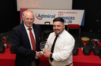 300526 - Rhymney RFC, Admiral National League 2 East Trophy Presentation - Colin Wilks, WRU National Council Member presents Rhymney RFC captain Tyler Evans with the league trophy after Rhymney win Admiral National League 2 East