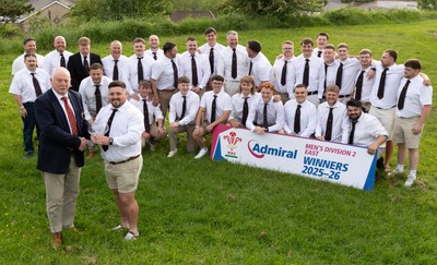 300526 - Rhymney RFC, Admiral National League 2 East Trophy Presentation - Colin Wilks, WRU National Council Member presents Rhymney RFC captain Tyler Evans with the league trophy after Rhymney win Admiral National League 2 East