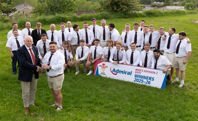 300526 - Rhymney RFC, Admiral National League 2 East Trophy Presentation - Colin Wilks, WRU National Council Member presents Rhymney RFC captain Tyler Evans with the league trophy after Rhymney win Admiral National League 2 East