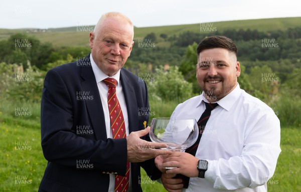 300526 - Rhymney RFC, Admiral National League 2 East Trophy Presentation - Colin Wilks, WRU National Council Member presents Rhymney RFC captain Tyler Evans with the league trophy after Rhymney win Admiral National League 2 East