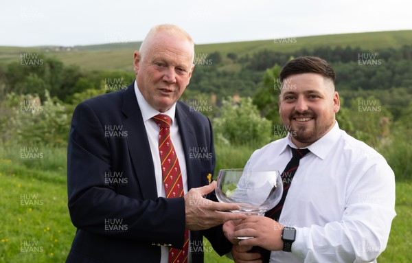 300526 - Rhymney RFC, Admiral National League 2 East Trophy Presentation - Colin Wilks, WRU National Council Member presents Rhymney RFC captain Tyler Evans with the league trophy after Rhymney win Admiral National League 2 East