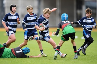 210525 - Rhymney Valley and Caerphilly District v Pembs Schools  - WSRU Junior Group - U11s DC Thomas Bowl Final - Lolo Badham of Pembs Schools is challenged by Tomos Chamberlain of Rhymney Valley and Caerphilly District