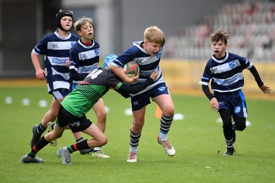 210525 - Rhymney Valley and Caerphilly District v Pembs Schools  - WSRU Junior Group - U11s DC Thomas Bowl Final - Lolo Badham of Pembs Schools is challenged by Tomos Chamberlain of Rhymney Valley and Caerphilly District