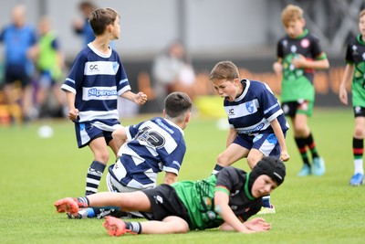 210525 - Rhymney Valley and Caerphilly District v Pembs Schools  - WSRU Junior Group - U11s DC Thomas Bowl Final - Billy Thomas of Pembs Schools celebrates scoring a try with team mates