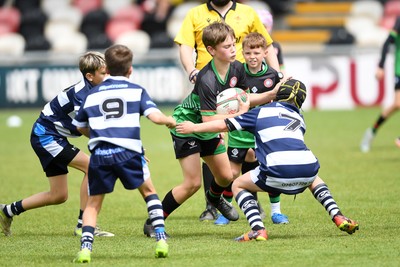 210525 - Rhymney Valley and Caerphilly District v Pembs Schools  - WSRU Junior Group - U11s DC Thomas Bowl Final - Isaac Henderson of Rhymney Valley and Caerphilly District is challenged by Ryan Kettle of Pembs Schools