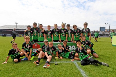 210525 - Rhymney Valley and Caerphilly District v Pembs Schools  - WSRU Junior Group - U11s DC Thomas Bowl Final - Rhymney Valley and Caerphilly District players celebrate lifting the trophy 