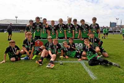 210525 - Rhymney Valley and Caerphilly District v Pembs Schools  - WSRU Junior Group - U11s DC Thomas Bowl Final - Rhymney Valley and Caerphilly District players celebrate lifting the trophy