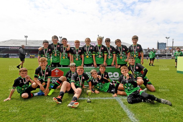210525 - Rhymney Valley and Caerphilly District v Pembs Schools  - WSRU Junior Group - U11s DC Thomas Bowl Final - Rhymney Valley and Caerphilly District players celebrate lifting the trophy 