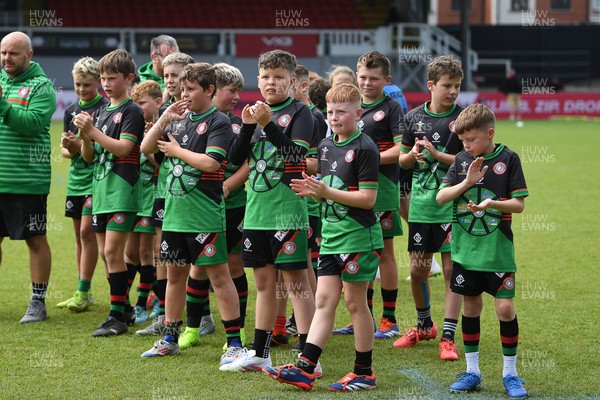 210525 - Rhymney Valley and Caerphilly District v Pembs Schools  - WSRU Junior Group - U11s DC Thomas Bowl Final - Rhymney Valley and Caerphilly District players applauding fans at full time